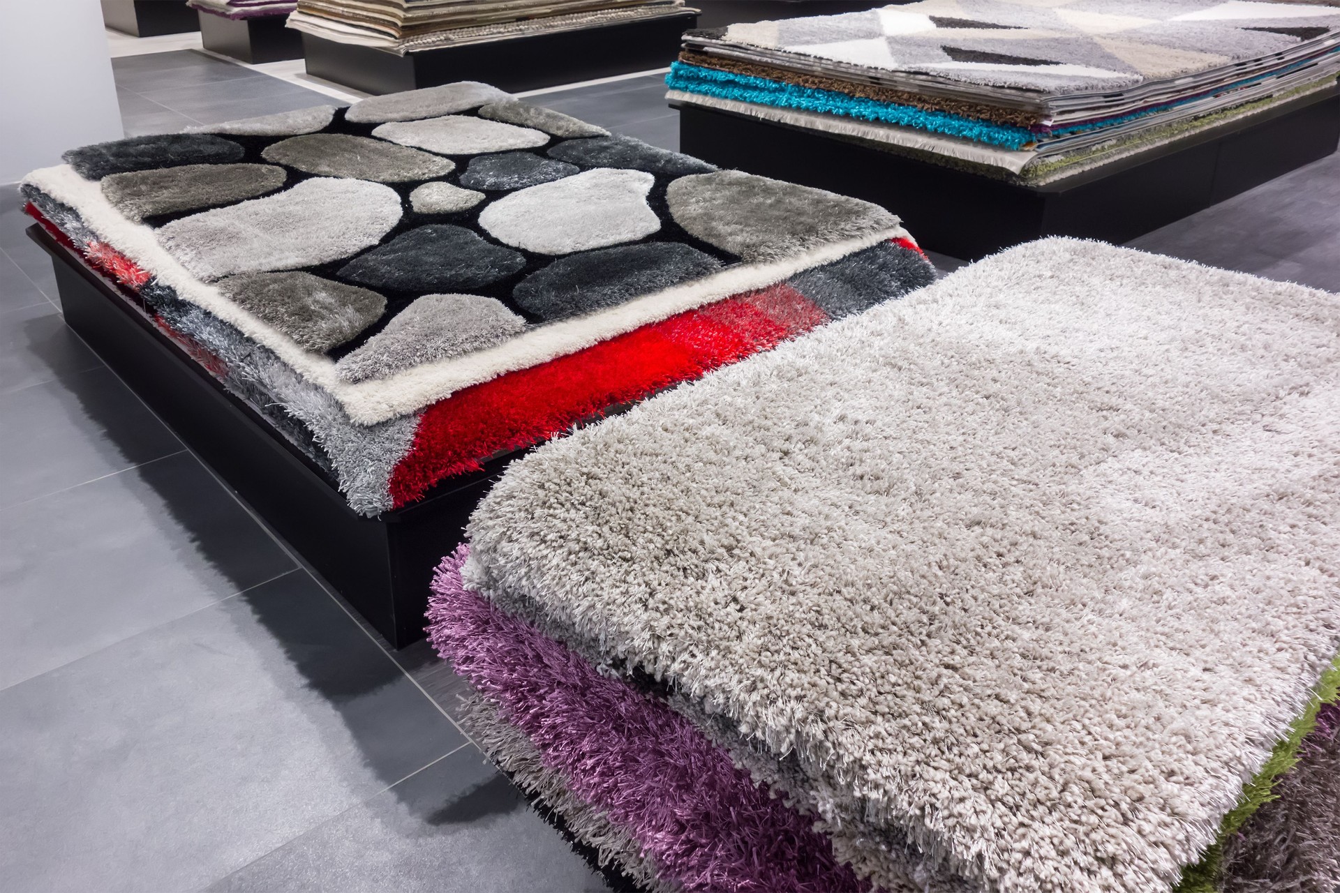 Many carpets in the store. Carpet shop. Carpet market